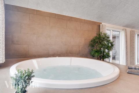 Nyd varmen i spaen i luksushus nr. 497 i Sydjylland