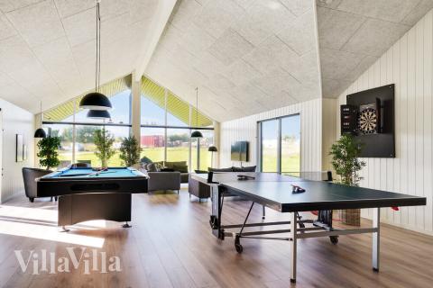 Ud over de mange timer, man kan bruge i husets pool-afdeling, så byder luksushus 497 også på billard/bordtennis og dart