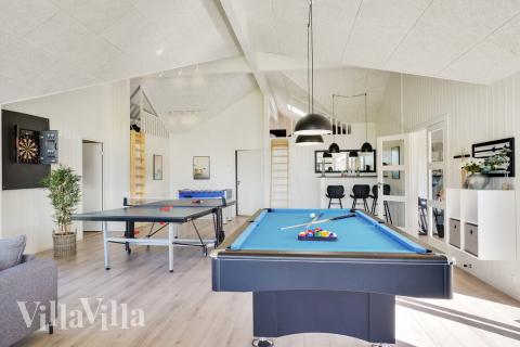 Luksushus 497 til 26 personer byder på et stort aktivitetsrum med bl.a. billard og dart