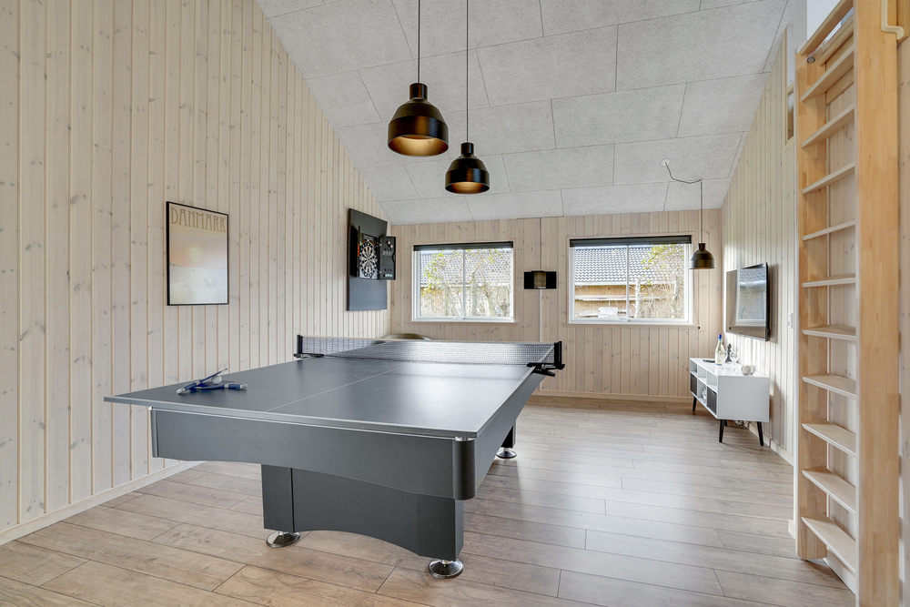 Ud over de mange timer, man kan bruge i husets pool-afdeling, så byder luksushus 522 også på billard/bordtennis og dart
