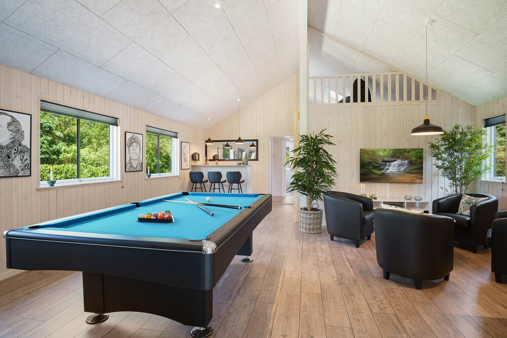 Ud over de mange timer, man kan bruge i husets pool-afdeling, så byder luksushus 498 også på billard/bordtennis og dart