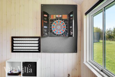 Dyst i sommerhusets aktivitetsrum, når I besøger luksushus nr. 521 i Sydjylland.