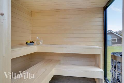 Nyd varmen i saunaen i luksushus nr. 521 til 16 personer