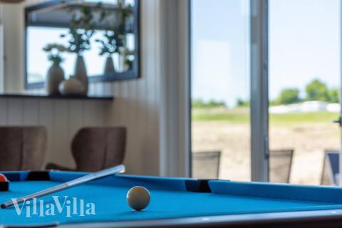 Aktivitetsrum i luksushus nr. 531 med 12 soveværelser og plads til 30 personer.