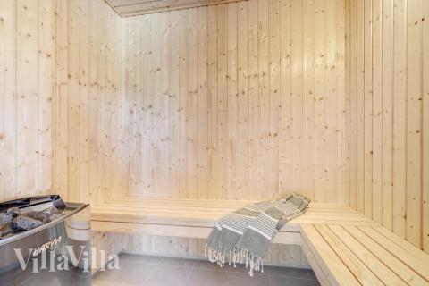 Nyd varmen i saunaen i luksushus nr. 516 til 24 personer