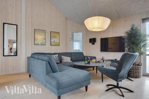 Sofaen i luksushus 526 i Sydjylland indbyder til brætspil eller at se en film sammen.