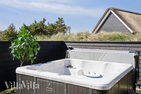 Nyd varmen i spaen i luksushus nr. 518 i Vestjylland