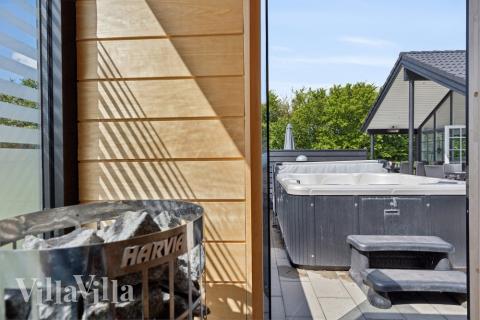 Nyd varmen i saunaen i luksushus nr. 520 til 18 personer