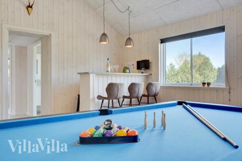 Dyst i sommerhusets aktivitetsrum, når I besøger luksushus nr. 525 i Lolland/Falster/Møn.