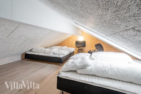 Nogle af de 16 sovepladser findes på hemsen i luksushus nr. 524