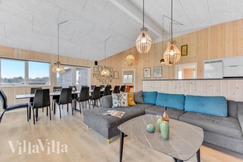 Der er mulighed for hygge i sommerhusets sofaarrangement, når I besøger luksushus nr. 539