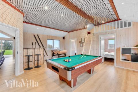 Ud over de mange timer, man kan bruge i husets pool-afdeling, så byder luksushus 539 også på billard/bordtennis og dart