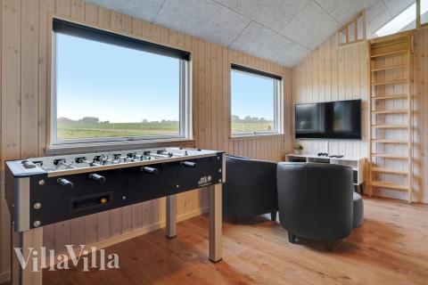 Aktivitetsrum i luksushus nr. 544 med 5 soveværelser og plads til 14 personer.