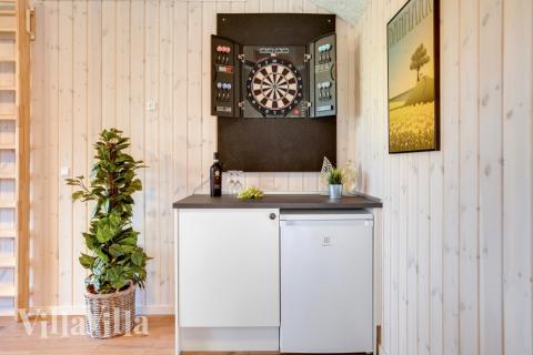 Dyst i sommerhusets aktivitetsrum, når I besøger luksushus nr. 544 i Østjylland.