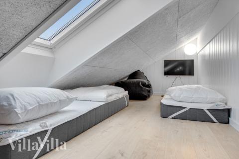 Nogle af de 14 sovepladser findes på hemsen i luksushus nr. 549