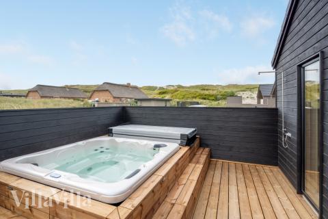 Nyd varmen i spaen i luksushus nr. 558 i Vestjylland