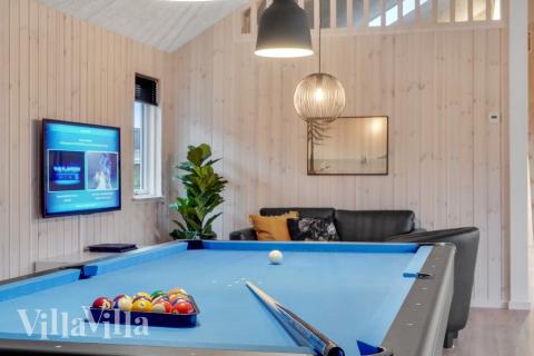 Ud over de mange timer, man kan bruge i husets pool-afdeling, så byder luksushus 545 også på billard/bordtennis og dart