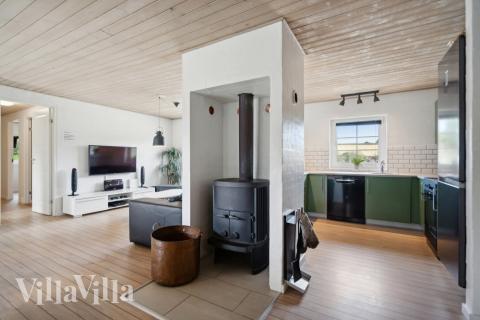 Opholdsrum med plads til 12 i luksushus nr. 572.