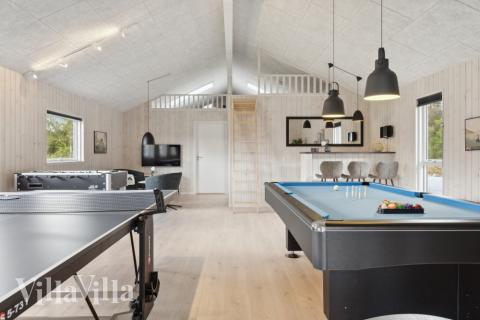 Aktivitetsrum i luksushus nr. 577 med 7 soveværelser og plads til 18 personer.