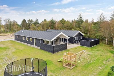 Dette skønne poolhus nr. 577 med plads til 18 personer ligger i Nordjylland
