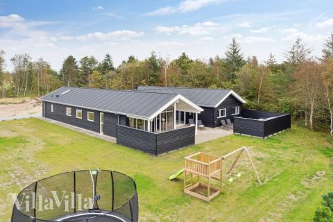 Dette skønne poolhus nr. 577 med plads til 18 personer ligger i Nordjylland