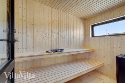 Nyd varmen i saunaen i luksushus nr. 580 til 16 personer