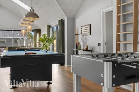 Dyst i sommerhusets aktivitetsrum, når I besøger luksushus nr. 554 i Vestjylland.