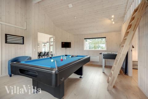 Aktivitetsrum i luksushus nr. 578 med 4 soveværelser og plads til 12 personer.