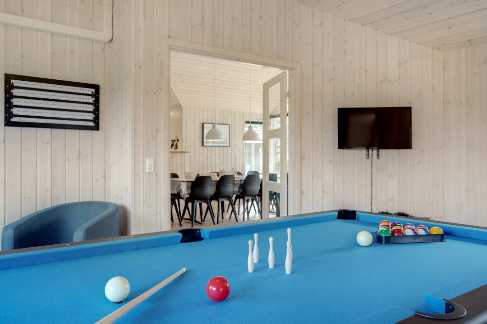 Ud over de mange timer, man kan bruge i husets pool-afdeling, så byder luksushus 578 også på billard/bordtennis og dart