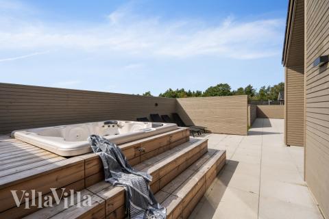 Nyd varmen i spaen i luksushus nr. 560 i Vestjylland