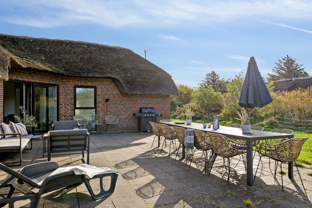 Nyd en grillaften på terrassen i luksushus nr. 557 i Vestjylland