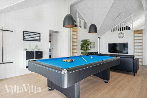 Dyst i sommerhusets aktivitetsrum, når I besøger luksushus nr. 583 i Vestjylland.