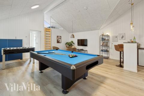 Ud over de mange timer, man kan bruge i husets pool-afdeling, så byder luksushus 593 også på billard/bordtennis og dart
