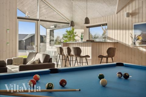 Ud over de mange timer, man kan bruge i husets pool-afdeling, så byder luksushus 594 også på billard/bordtennis og dart