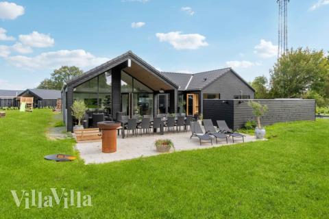 Flot sommerhus nr. 582 med god plads til op til 14 personer