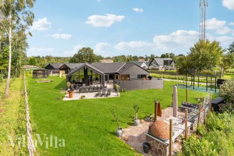 Dette skønne poolhus nr. 582 med plads til 14 personer ligger i Nordsjælland