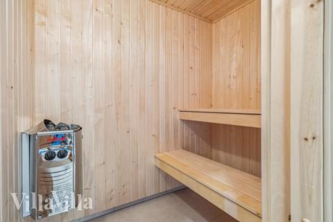 Nyd varmen i saunaen i luksushus nr. 750 til 18 personer