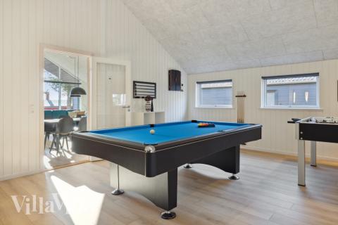 Ud over de mange timer, man kan bruge i husets pool-afdeling, så byder luksushus 753 også på billard/bordtennis og dart