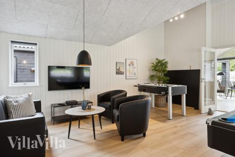 Aktivitetsrum i luksushus nr. 756 med 6 soveværelser og plads til 16 personer.