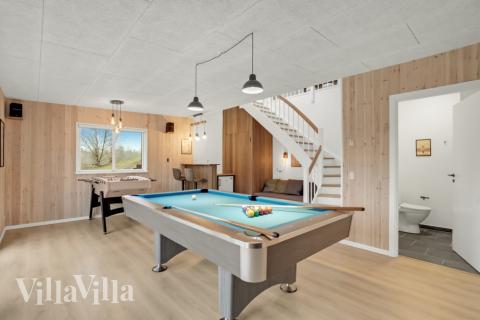 Ud over de mange timer, man kan bruge i husets pool-afdeling, så byder luksushus 603 også på billard/bordtennis og dart