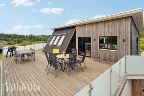 Luksushus nr. 603 har en dejlig terrasse med gode havemøbler til 12 personer.