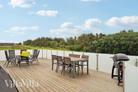 Nyd en grillaften på terrassen i luksushus nr. 603 i Limfjorden