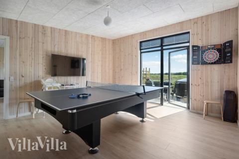 Ud over de mange timer, man kan bruge i husets pool-afdeling, så byder luksushus 604 også på billard/bordtennis og dart