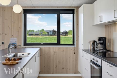 Køkkenet i luksushus nr. 604 er udstyrret, så I let kan lave mad til 16 personer.