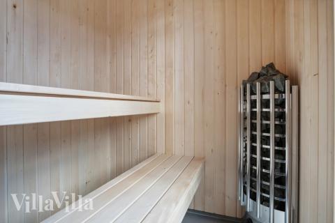 Nyd varmen i saunaen i luksushus nr. 606 til 6 personer