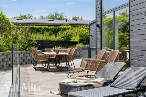Nyd en grillaften på terrassen i luksushus nr. 606 i Østjylland