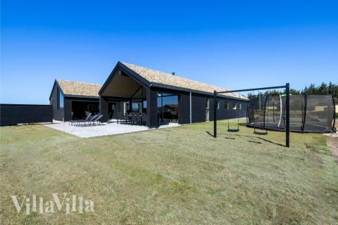 Dette skønne poolhus nr. 609 med plads til 18 personer ligger i Vestjylland