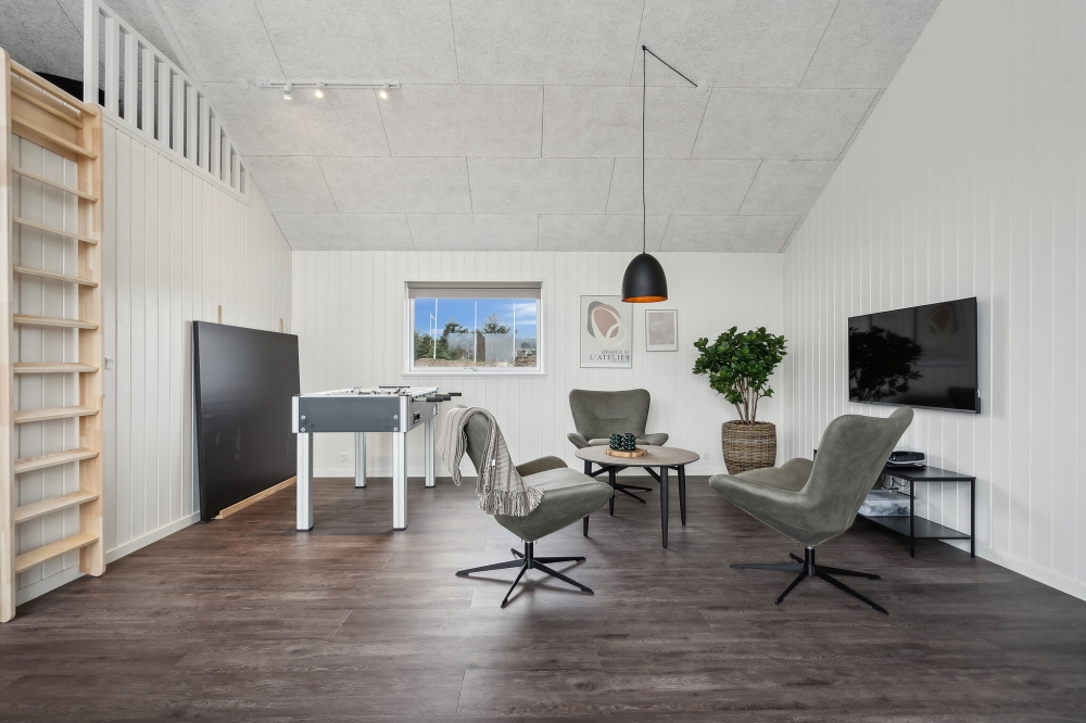 Dyst i sommerhusets aktivitetsrum, når I besøger luksushus nr. 610 i Vestjylland.