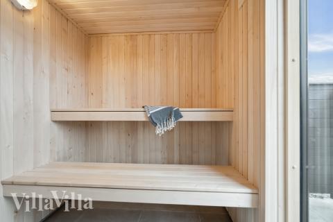 Nyd varmen i saunaen i luksushus nr. 610 til 18 personer