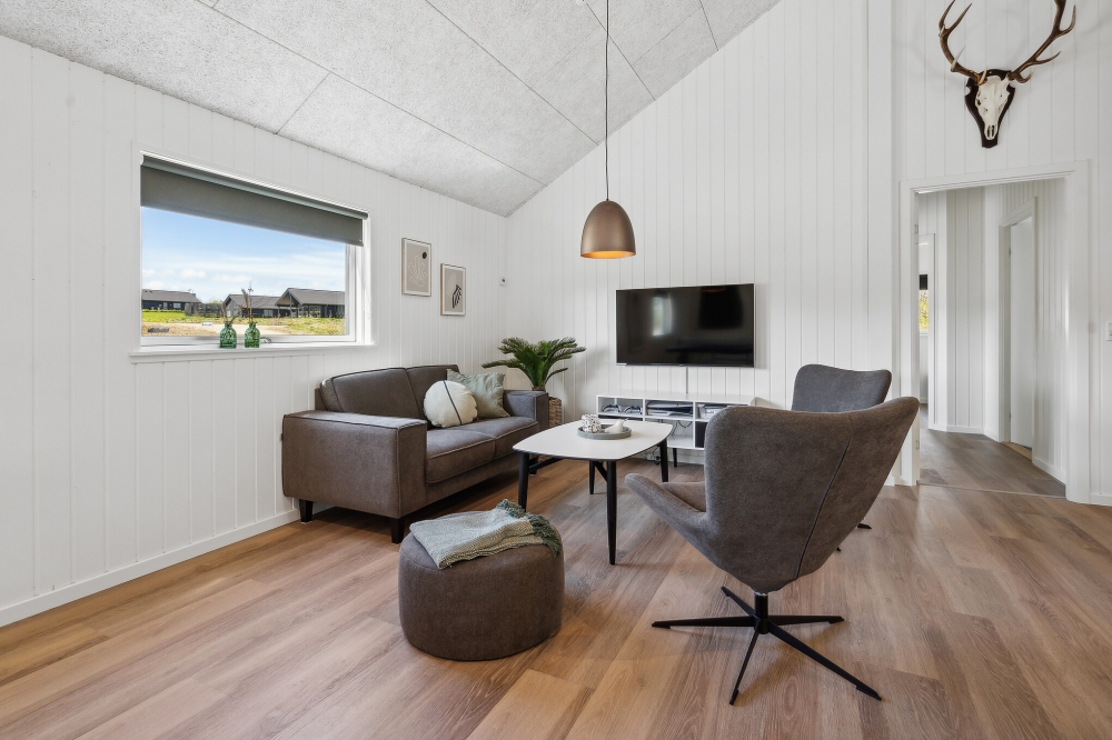 Dyst i sommerhusets aktivitetsrum, når I besøger luksushus nr. 612 i Sydjylland.